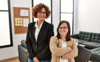 Group of two women working at the office